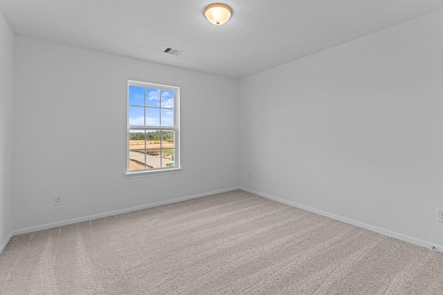 Your secondary bedroom features plush carpet, fresh paint, closet, and a large window that lets in plenty of natural lighting. Your secondary bedroom features plush carpet, fresh paint, closet, and a large window that lets in plenty of natural lighting.