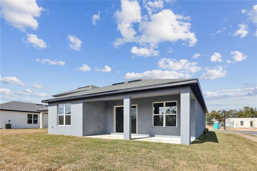 Exterior details and patio area of a home in , Palm Coast (Image 3).