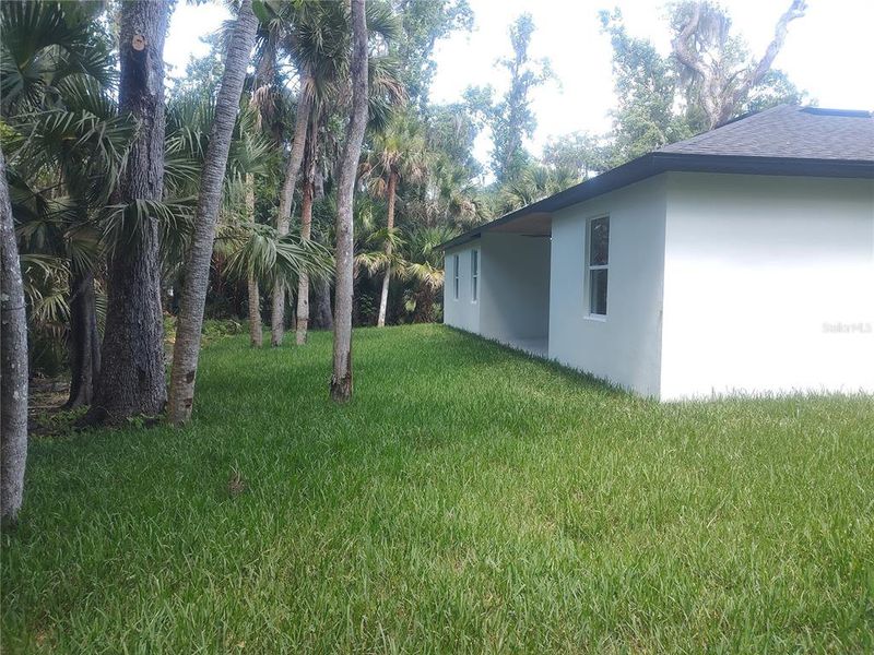 Exterior details and patio area of a home in , New Smyrna Beach (Image 16).