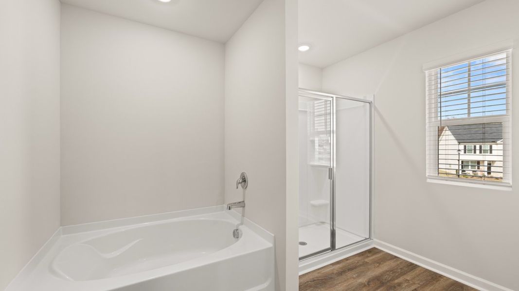 Furnished interior view inside a new home in The Reserve at Calcutta, Stockbridge (Image 7).