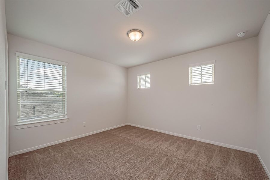 Spacious, unfurnished interior of a new home in Enclave At Dobbin, Magnolia (Image 29).