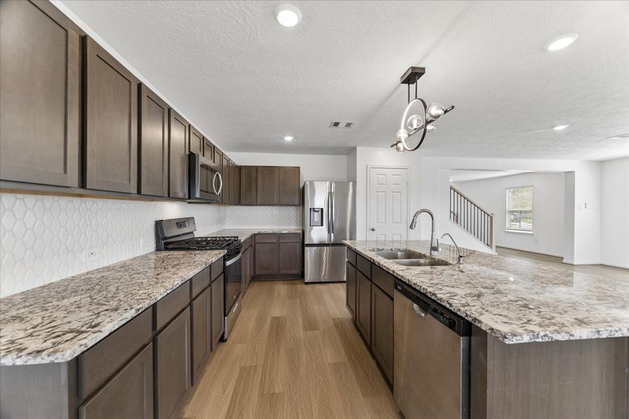 Furnished interior view inside a new home in Grace Landing, Willis (Image 11). Furnished interior view inside a new home in Grace Landing, Willis (Image 11).