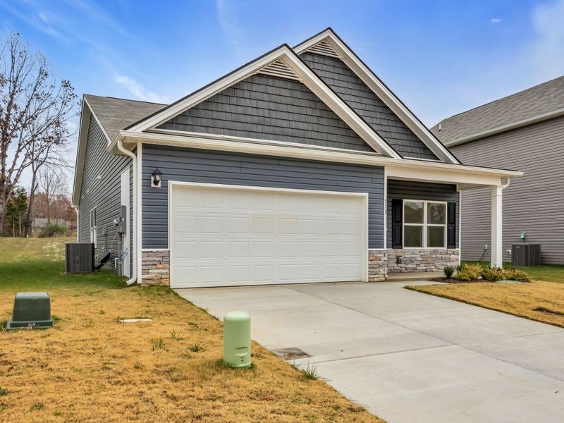 Front exterior of a new home in Cantigny Park, Clarksville, TN, highlighting curb appeal (Image 19).