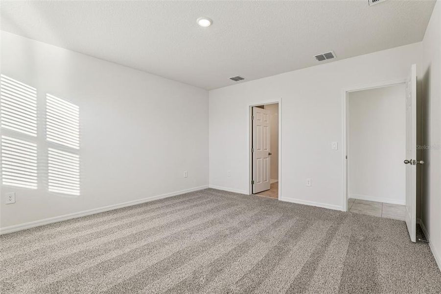 Spacious, unfurnished interior of a new home in Lawson Dunes - Signature Series, Haines City (Image 36). Spacious, unfurnished interior of a new home in Lawson Dunes - Signature Series, Haines City (Image 36).