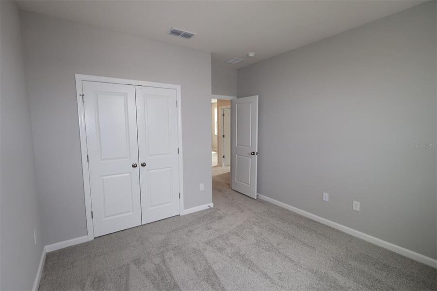 Spacious, unfurnished interior of a new home in Center Lake on the Park, St. Cloud (Image 22).