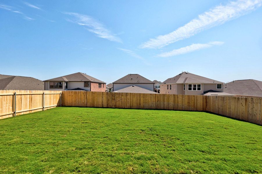 Front exterior of a new home in Salerno - Classic Collection, Round Rock, TX, highlighting curb appeal (Image 18). Front exterior of a new home in Salerno - Classic Collection, Round Rock, TX, highlighting curb appeal (Image 18).
