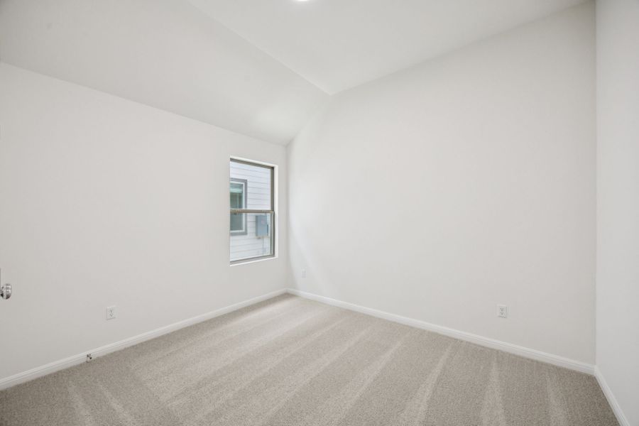 Bedroom in the Cypress home plan by Trophy Signature Homes - REPRESENTATIVE PHOTO Bedroom in the Cypress home plan by Trophy Signature Homes - REPRESENTATIVE PHOTO