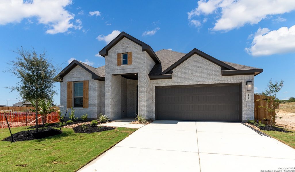 Front exterior of a new home in Alsatian Oaks, Castroville, TX, highlighting curb appeal (Image 2).