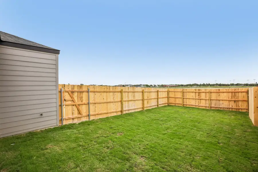 Exterior details and patio area of a home in Parkton Square, Kyle (Image 4).