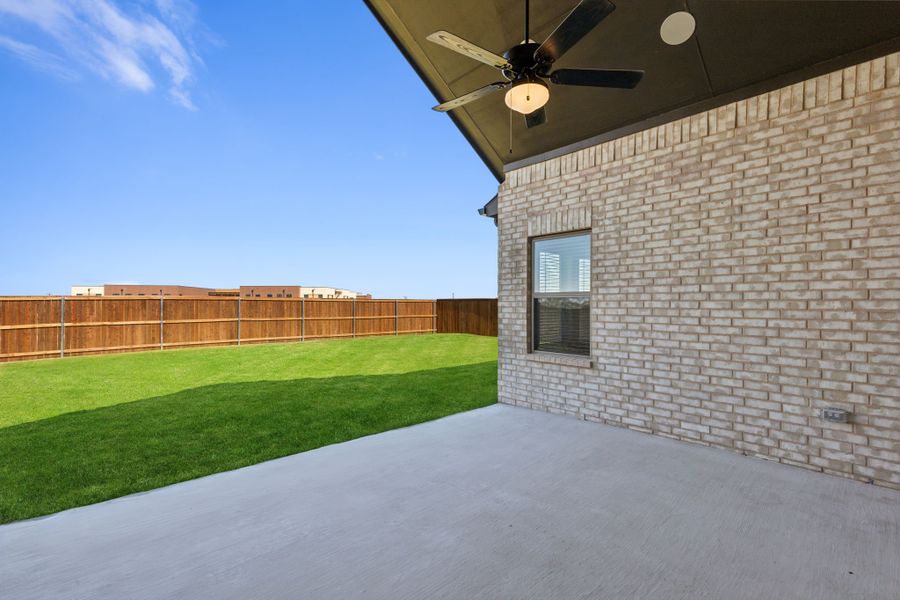Exterior details and patio area of a home in Silo Mills, Joshua (Image 25).