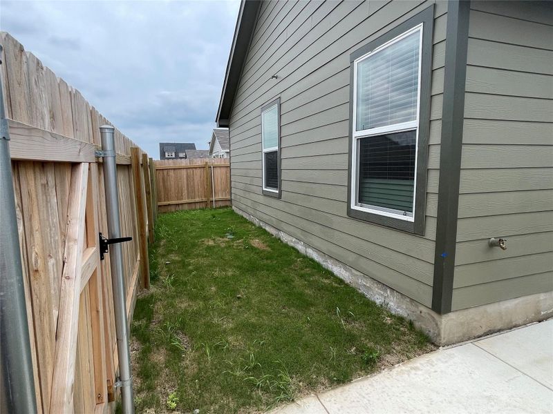 Front exterior of a new home in Waterstone: Stonehill Collection, Kyle, TX, highlighting curb appeal (Image 10). Front exterior of a new home in Waterstone: Stonehill Collection, Kyle, TX, highlighting curb appeal (Image 10).