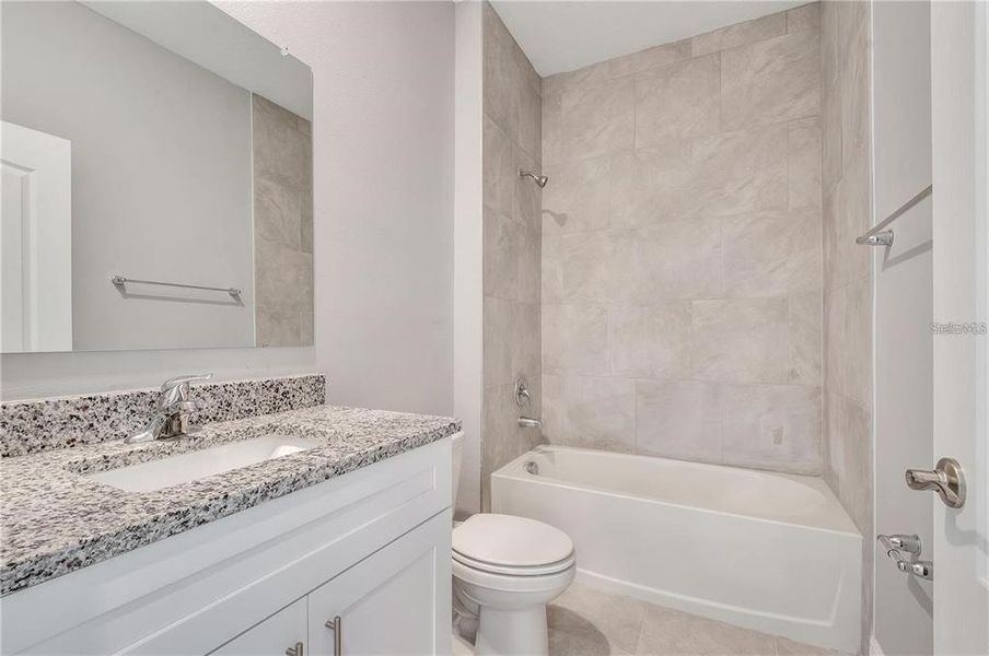 Furnished interior view inside a new home in , Kissimmee (Image 8).