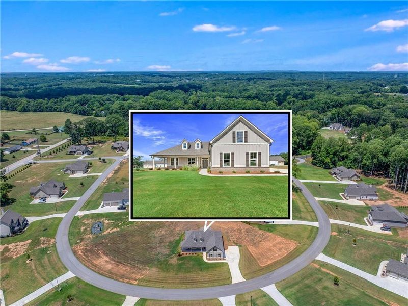 Front exterior of a new home in , Jefferson, GA, highlighting curb appeal (Image 24).