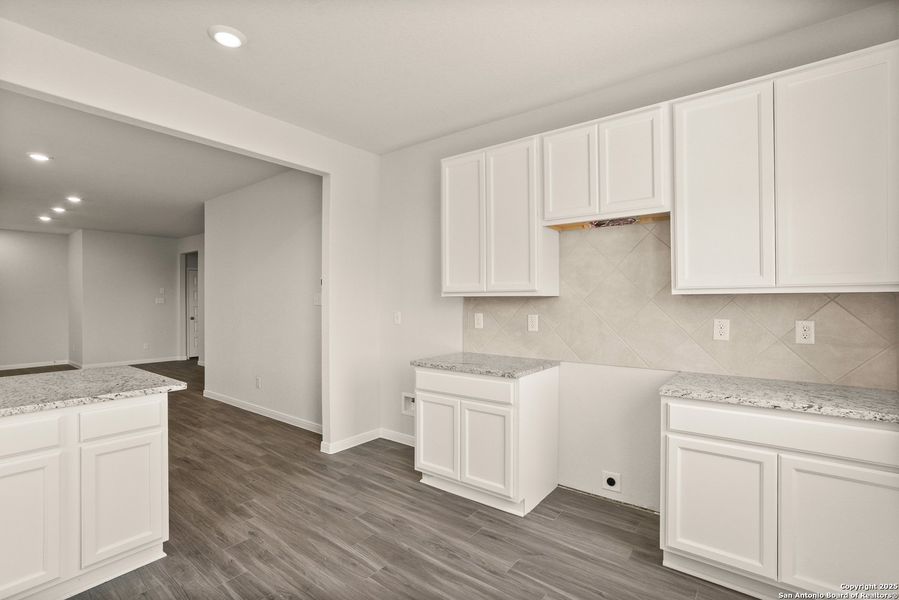 Furnished interior view inside a new home in Abbott Place, St. Hedwig (Image 8).