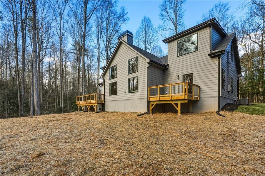 Exterior details and patio area of a home in , Ellijay (Image 30).