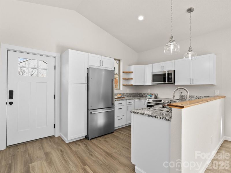 Furnished interior view inside a new home in , Waynesville (Image 7).