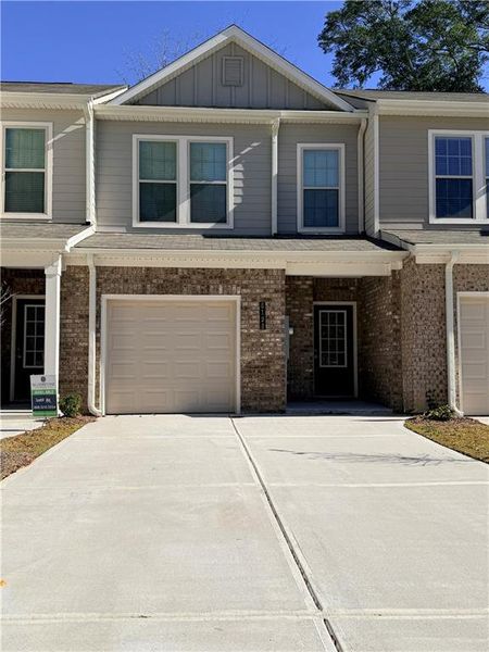 Front exterior of a new home in Morning Creek Forest, South Fulton, GA, highlighting curb appeal (Image 1). Front exterior of a new home in Morning Creek Forest, South Fulton, GA, highlighting curb appeal (Image 1).