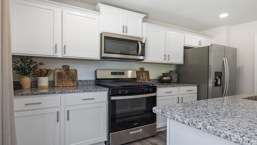 Furnished interior view inside a new home in Bentley Park, Greenwood (Image 16).