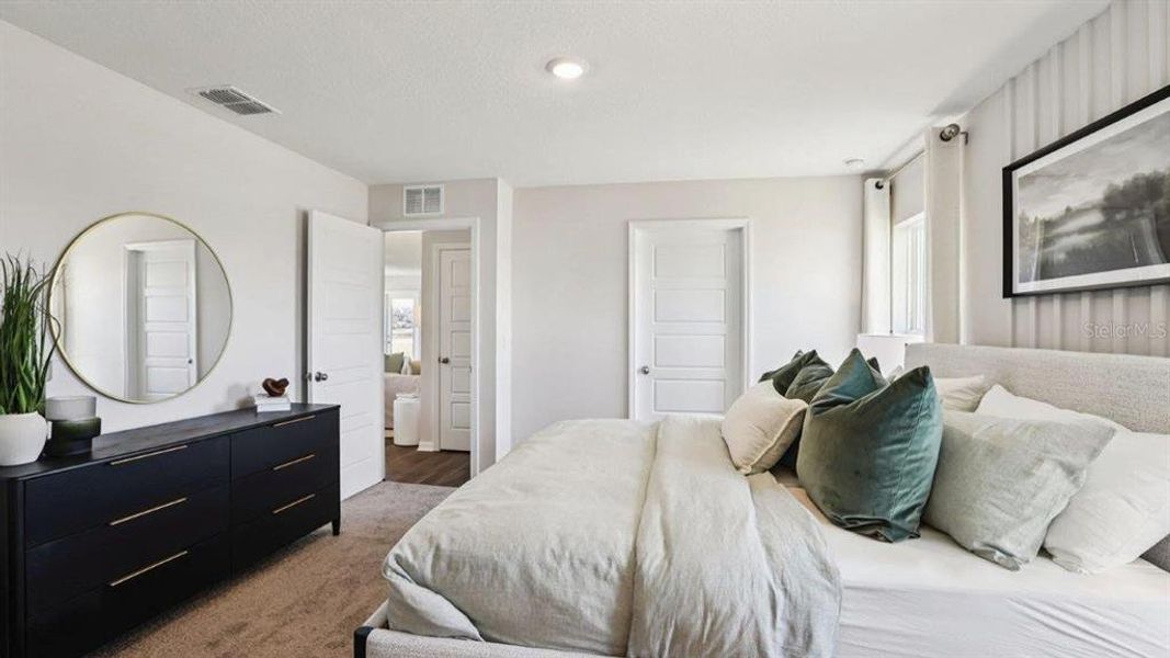 Furnished interior view inside a new home in Lake Deer Estates, Poinciana (Image 20).