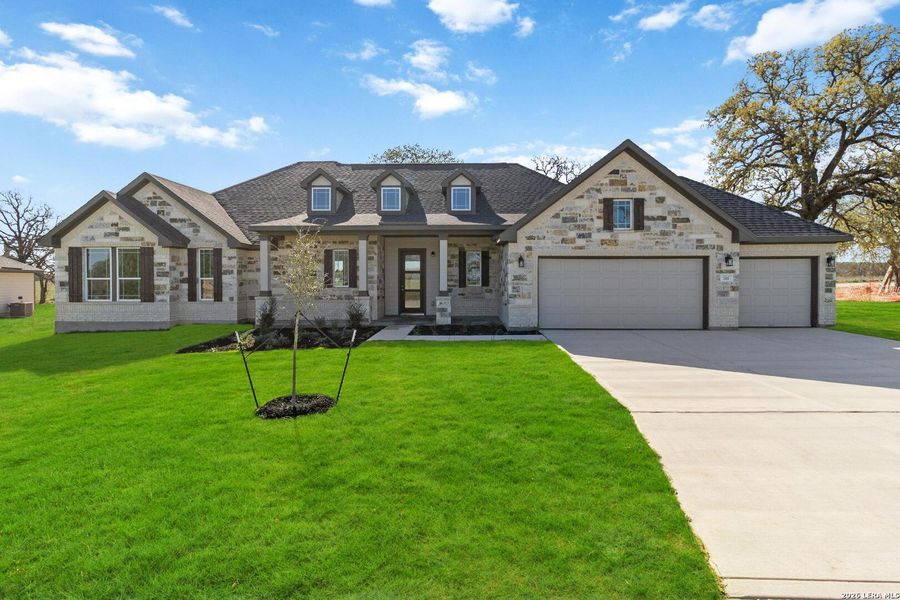Front exterior of a new home in Lonesome Dove, San Antonio, TX, highlighting curb appeal (Image 19). Front exterior of a new home in Lonesome Dove, San Antonio, TX, highlighting curb appeal (Image 19).