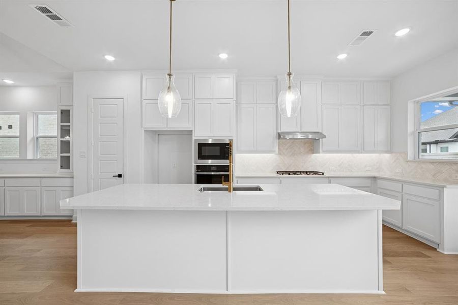 Furnished interior view inside a new home in Pecan Square - Gardens, Northlake (Image 8). Furnished interior view inside a new home in Pecan Square - Gardens, Northlake (Image 8).