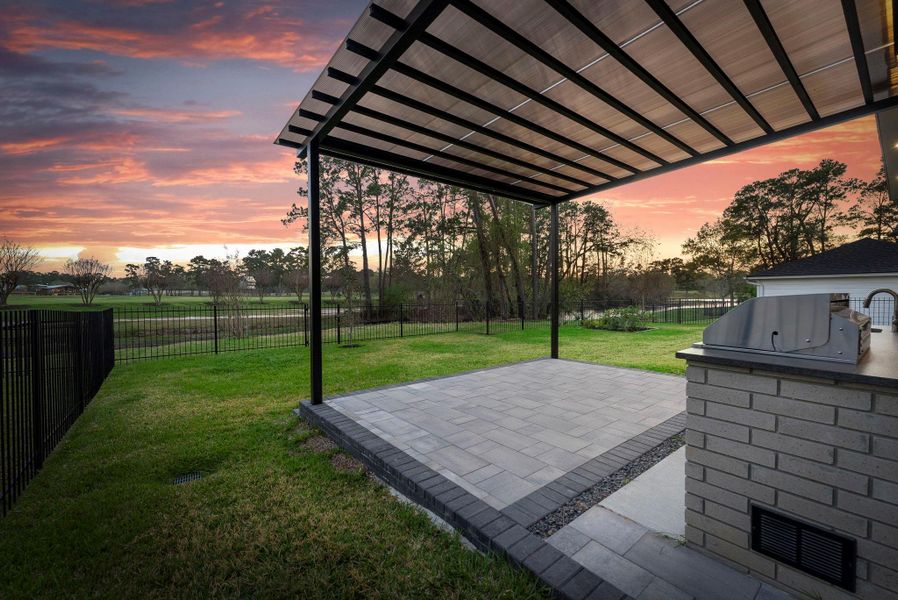 Exterior details and patio area of a home in , The Woodlands (Image 30).