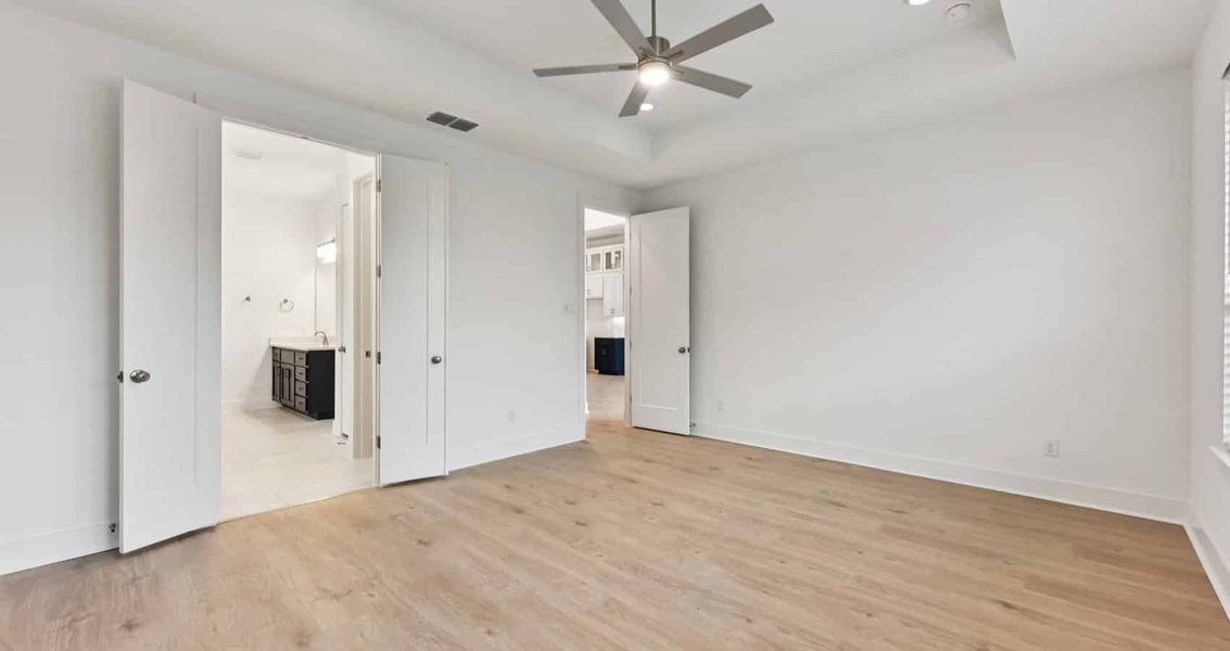 Spacious, unfurnished interior of a new home in Sweetwater, Austin (Image 22).