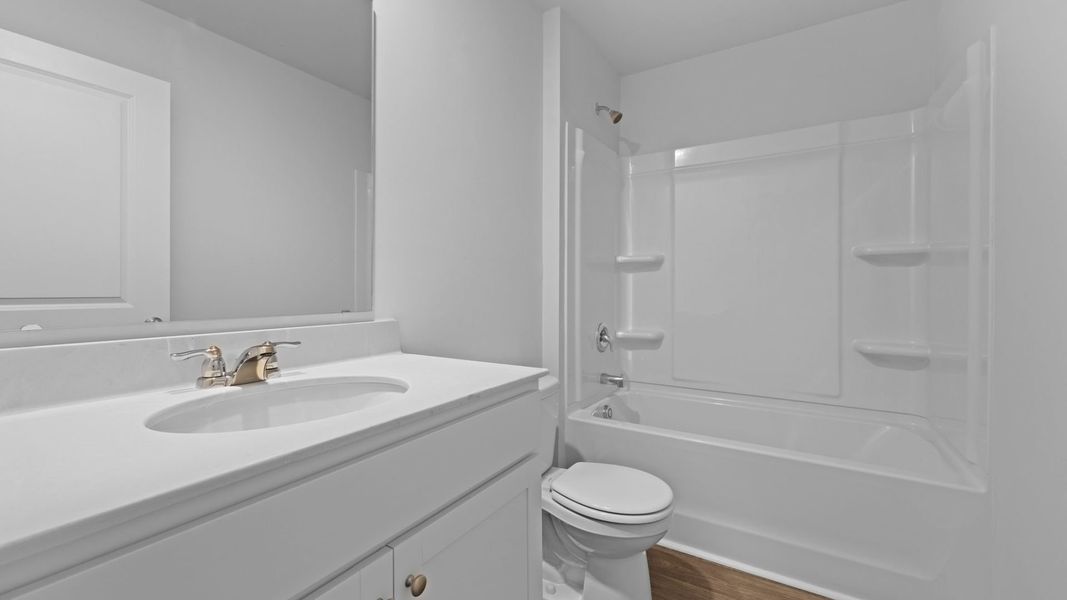 Representative furnished interior of a home built from the HELENA by D.R. Horton in Center Pointe, Santee (Image 7).