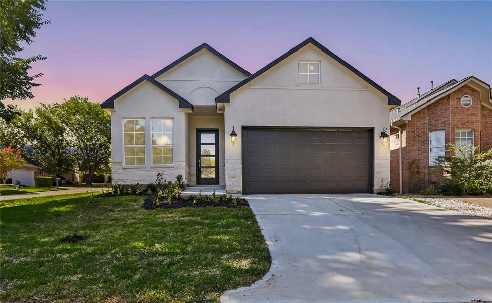 Front exterior of a new home in , Conroe, TX, highlighting curb appeal (Image 26).