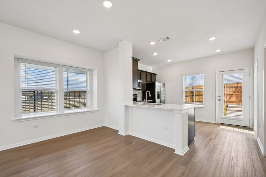 Furnished interior view inside a new home in Whisper Valley, Manor (Image 9).