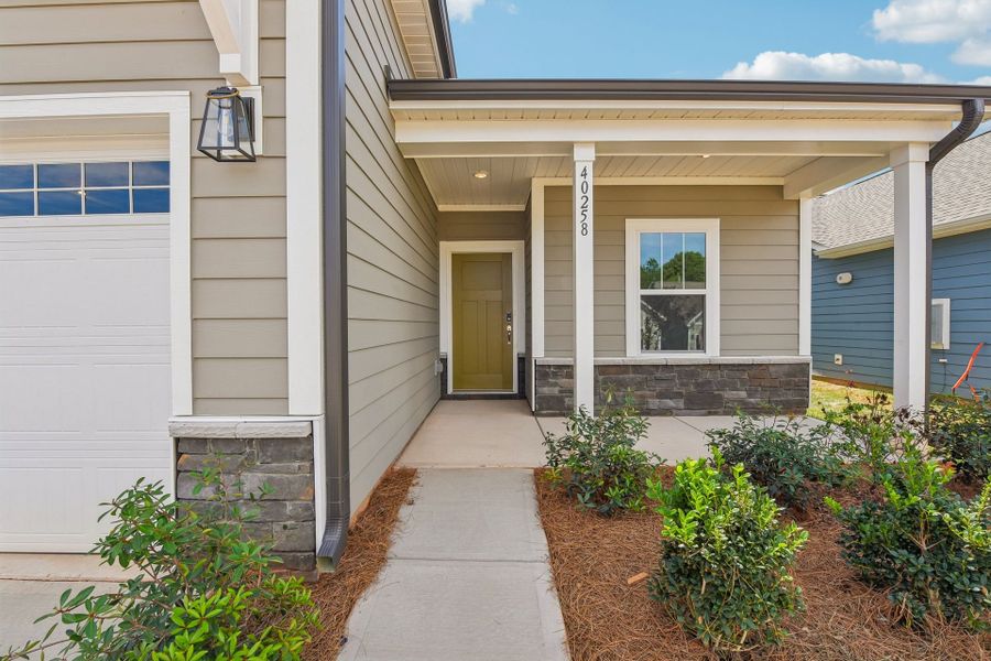 Exterior details and patio area of a home in Edgewater - The Cottages, Lancaster (Image 3).