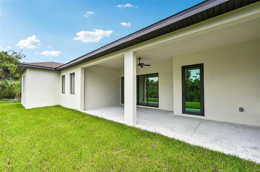 Exterior details and patio area of a home in , North Port (Image 22).