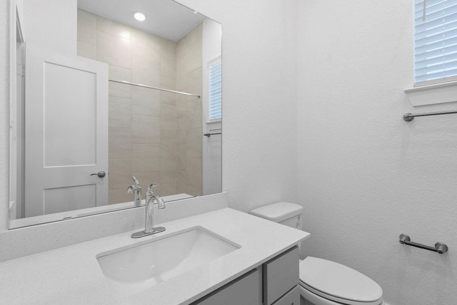 Furnished interior view inside a new home in Wildrye 45', Waller (Image 13).