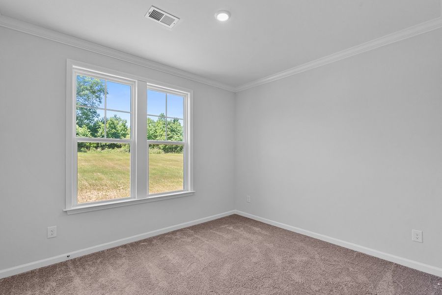 Spacious, unfurnished interior of a new home in Lilah Grove, Summerfield (Image 27).