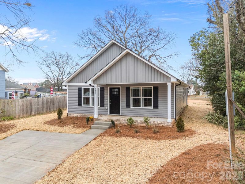 Front exterior of a new home in , Norwood, NC, highlighting curb appeal (Image 22).