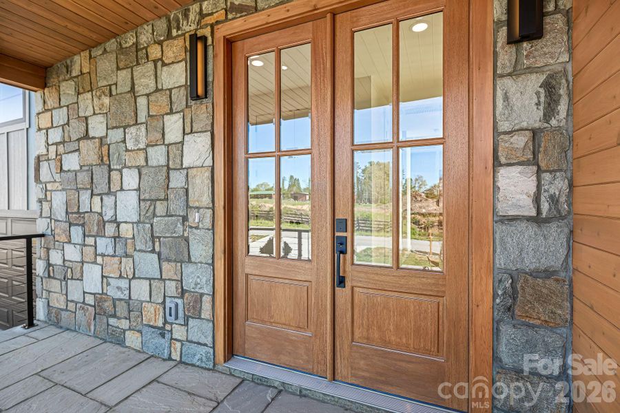 Exterior details and patio area of a home in , Flat Rock (Image 31).