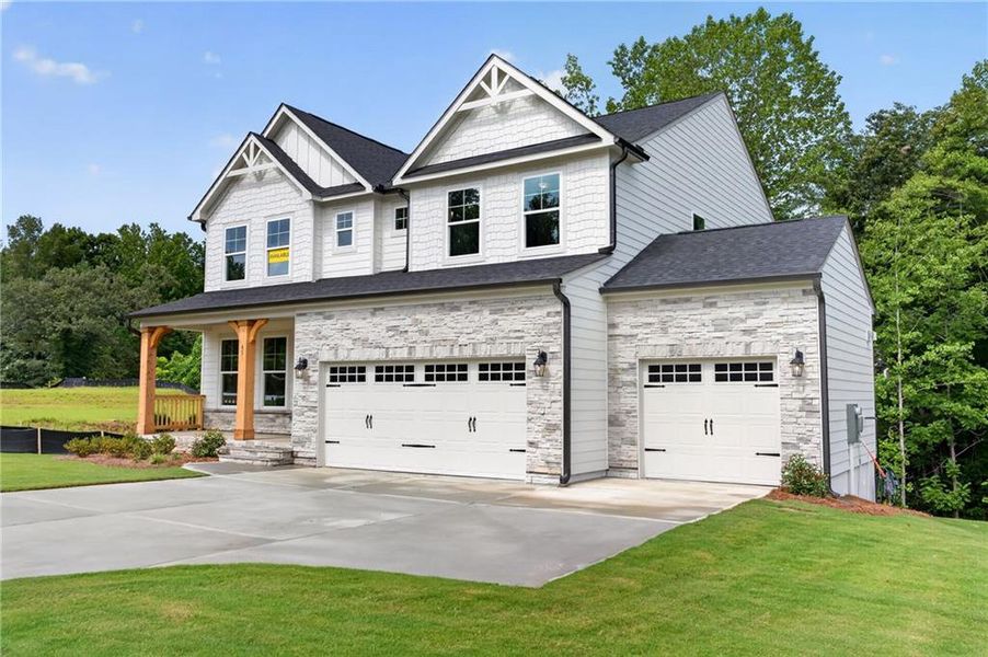 Front exterior of a new home in Arbor West, Dawsonville, GA, highlighting curb appeal (Image 25).