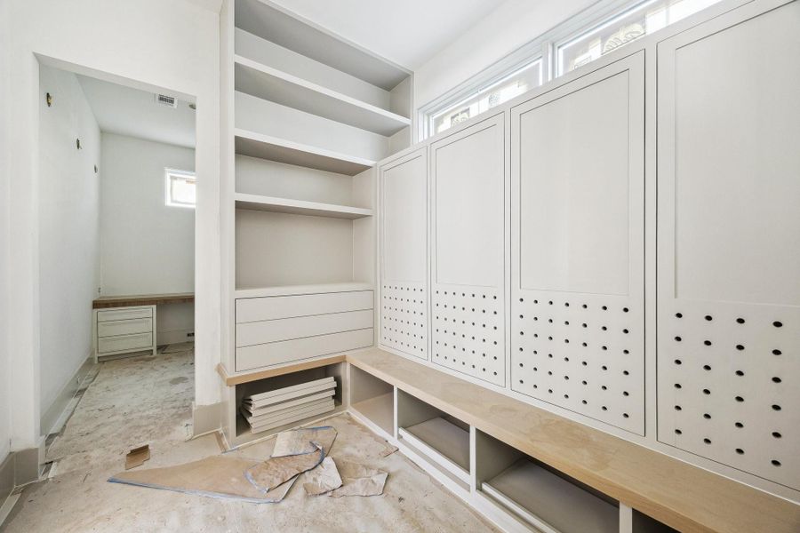 Mud Area with built-in lockers off of the garage entrance of the home.