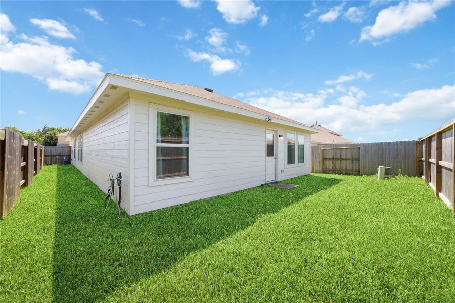 Exterior details and patio area of a home in Becker Landing, Hockley (Image 4).