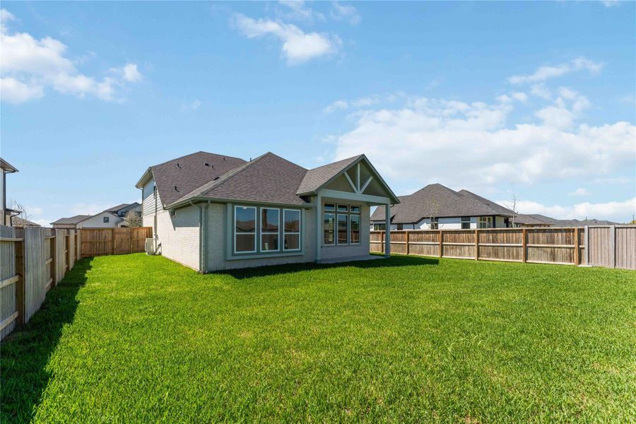 Exterior details and patio area of a home in Arabella on the Prairie, Richmond (Image 21).