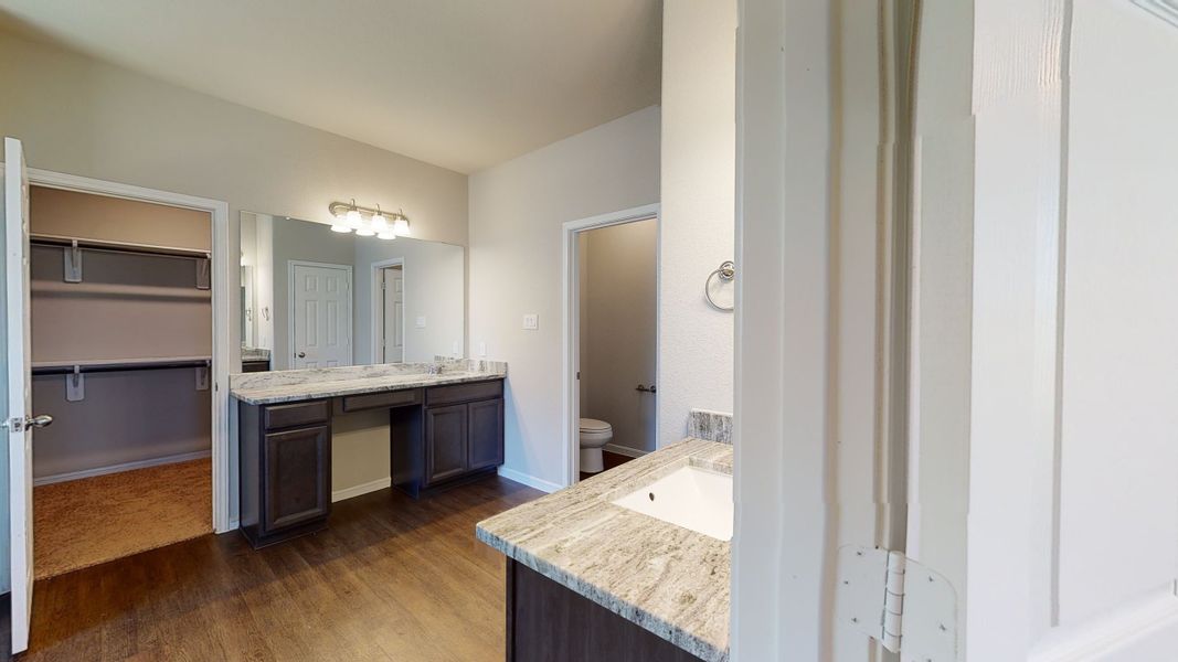 Representative furnished interior of a home built from the Floor Plan 3256 by Colina Homes in Grand Magnolia, Magnolia (Image 13).