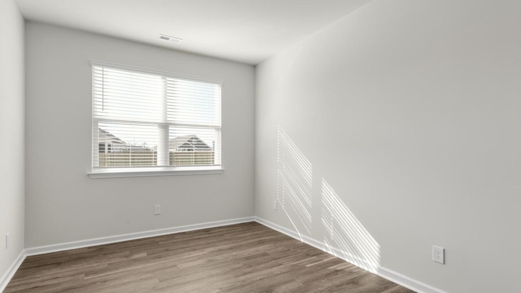 Spacious, unfurnished interior of a new home in Indigo Preserve, Leland (Image 17).