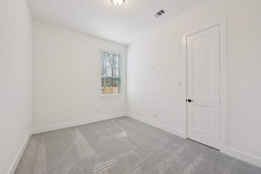 Spacious, unfurnished interior of a new home in The Woodlands Hills, Willis (Image 32).