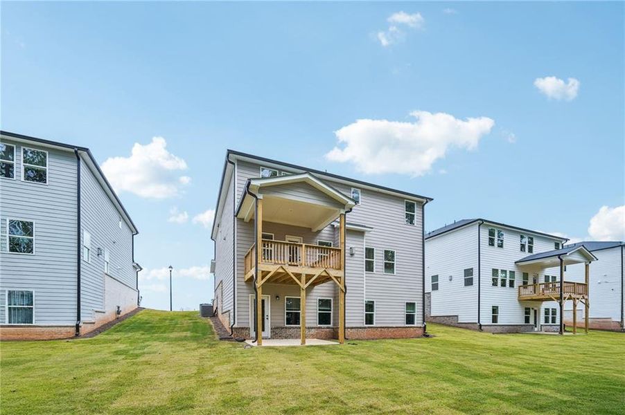 Exterior details and patio area of a home in Martin Springs - Estate Series, Lawrenceville (Image 3).