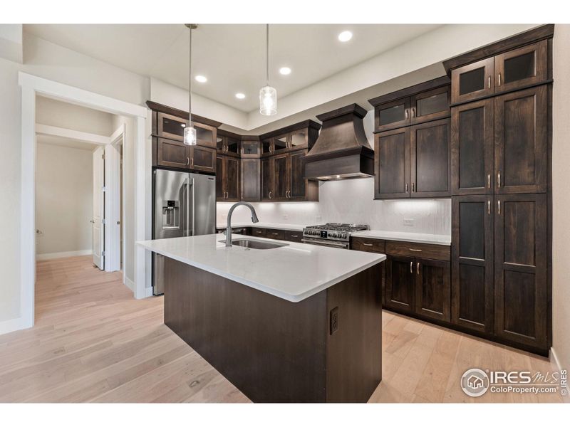 Kitchen located conveniently close to the garage.