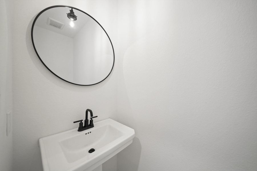 Half bath (*Photo not of actual home and used for illustration purposes only.) Half bath (*Photo not of actual home and used for illustration purposes only.)