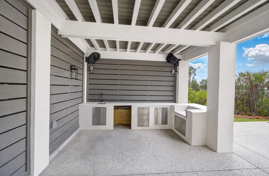 Exterior details and patio area of a home in , Awendaw (Image 18).