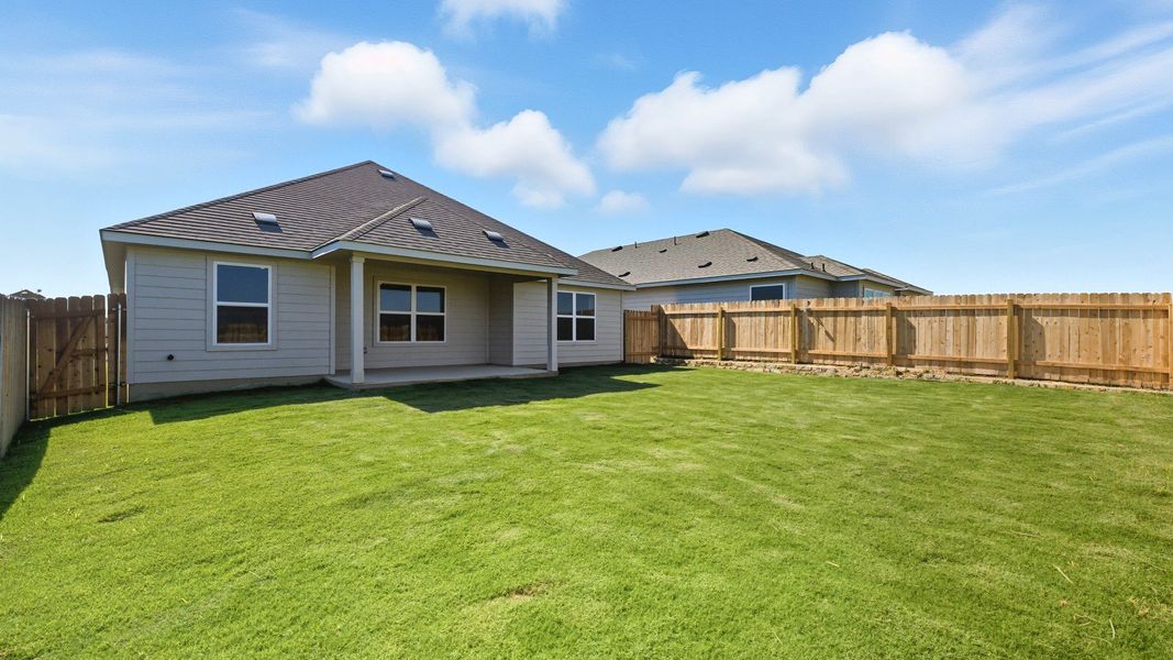 Exterior details and patio area of a home in Hunters Glen, Jarrell (Image 4).
