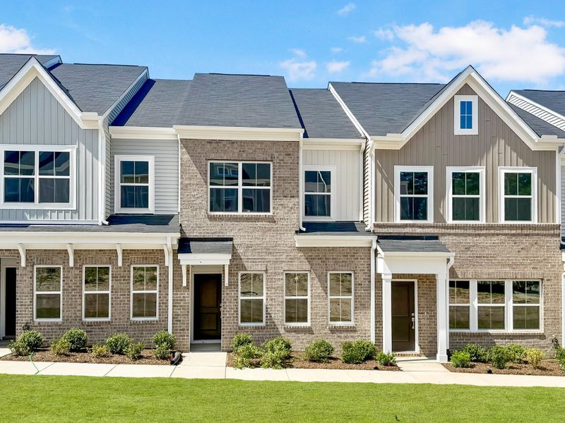 Front exterior of a new home in Renaissance at White Oak, Garner, NC, highlighting curb appeal (Image 1). Front exterior of a new home in Renaissance at White Oak, Garner, NC, highlighting curb appeal (Image 1).