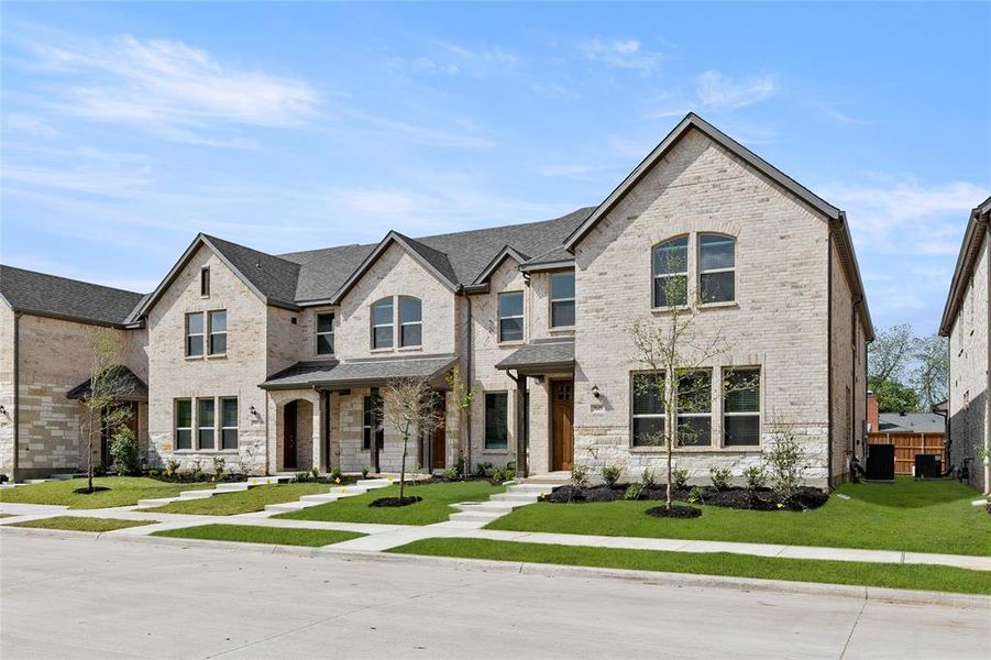 Front exterior of a new home in Timber Ridge, Corinth, TX, highlighting curb appeal (Image 1).